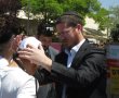 "וקשרתם לאות" בפתח בית העלמין