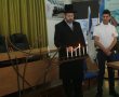 הרב הראשי לישראל הרב דוד לאו הדליק נר שישי של חנוכה עם עובדי ומתנדבי מד"א